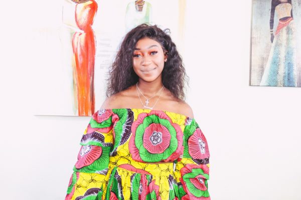Zim Queen Sharma in Angelle Fenton in Sunflower 2-piece Ankara Print Crop Top and thigh-High Split Maxi Skirt by Yvonne Irenroa African Fashion