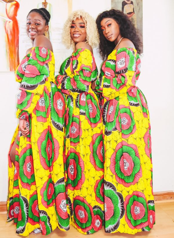 Black Queens in Angelle Fenton in Sunflower 2-piece Ankara Print Crop Top and thigh-High Split Maxi Skirt by Yvonne Irenroa African Fashion
